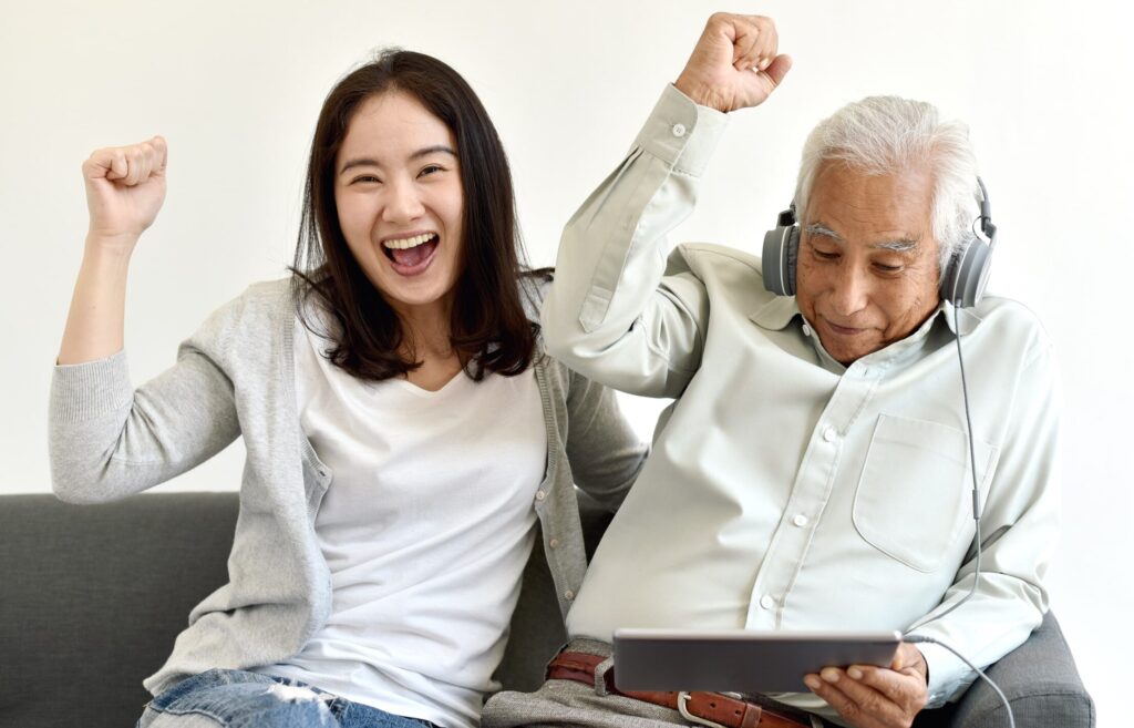 two generations watching tablet